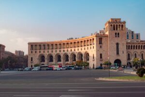 View of a historic government building in Yerevan, Armenia, on a clear summer day.